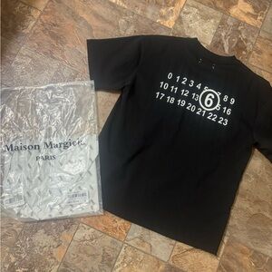 Tommy Cash x Maison Margiela T-shirt
Maison Martin Margiela Black Graphic Tee